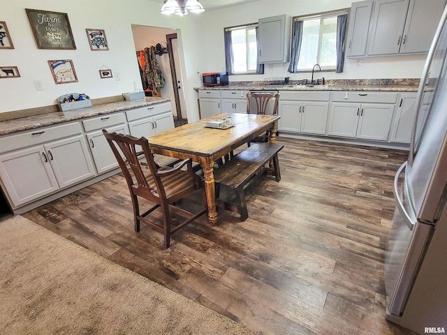 232 Palm Ln, Flora, IL 62839 - dining space featuring dark wood-style flooring