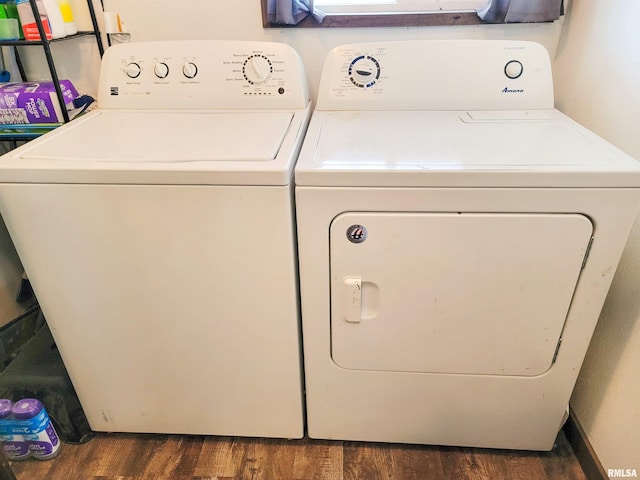 232 Palm Ln, Flora, IL 62839 - laundry area featuring washer and clothes dryer and dark wood finished floors