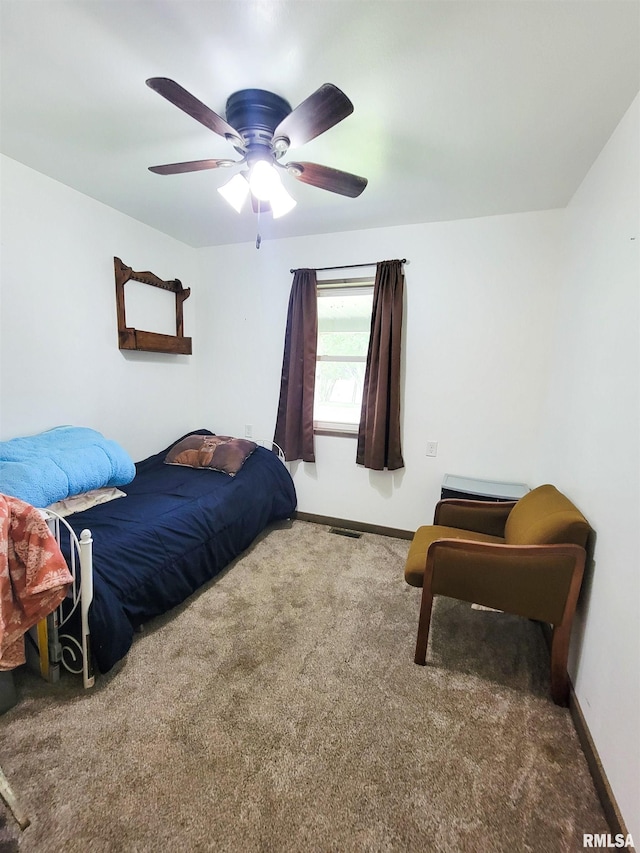 232 Palm Ln, Flora, IL 62839 - carpeted bedroom featuring baseboards and ceiling fan