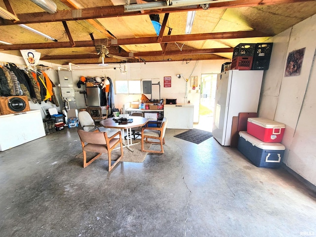 232 Palm Ln, Flora, IL 62839 - garage featuring freestanding refrigerator