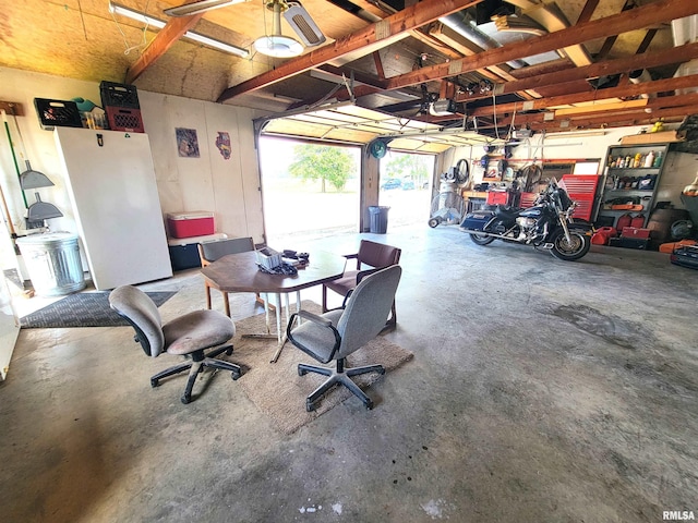 232 Palm Ln, Flora, IL 62839 - garage featuring a garage door opener