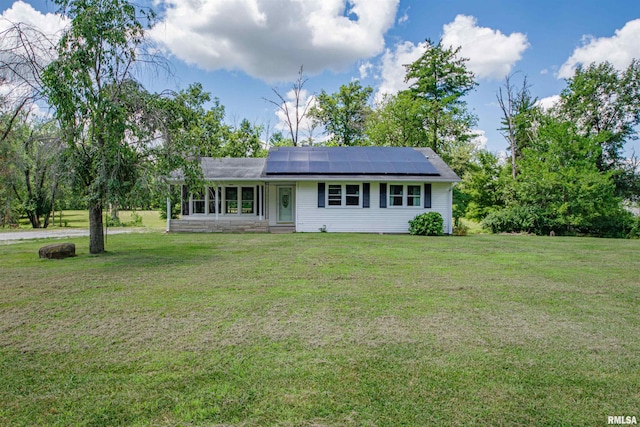 1471 Woods Ln, Centralia, IL 62801 - single story home featuring solar panels, a front lawn, and entry steps