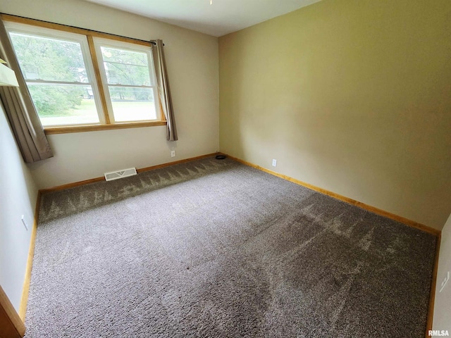 1471 Woods Ln, Centralia, IL 62801 - unfurnished room featuring carpet and baseboards