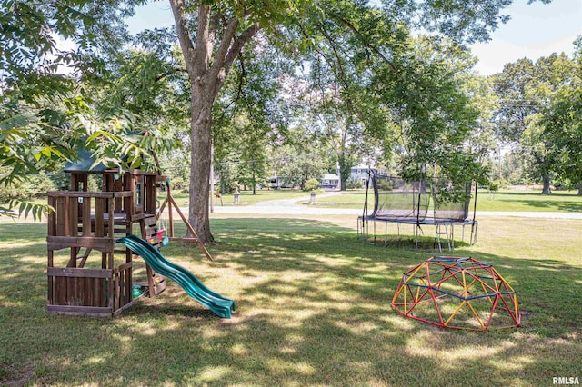 1471 Woods Ln, Centralia, IL 62801 - view of jungle gym with a trampoline and a lawn