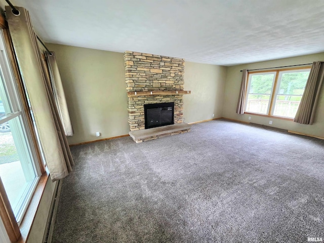 1471 Woods Ln, Centralia, IL 62801 - unfurnished living room with carpet floors and a fireplace