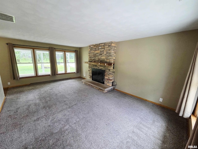 1471 Woods Ln, Centralia, IL 62801 - unfurnished living room with a fireplace and carpet floors