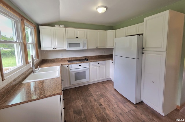 1471 Woods Ln, Centralia, IL 62801 - kitchen with white appliances, dark wood-style flooring, lofted ceiling, white cabinetry, and tasteful backsplash