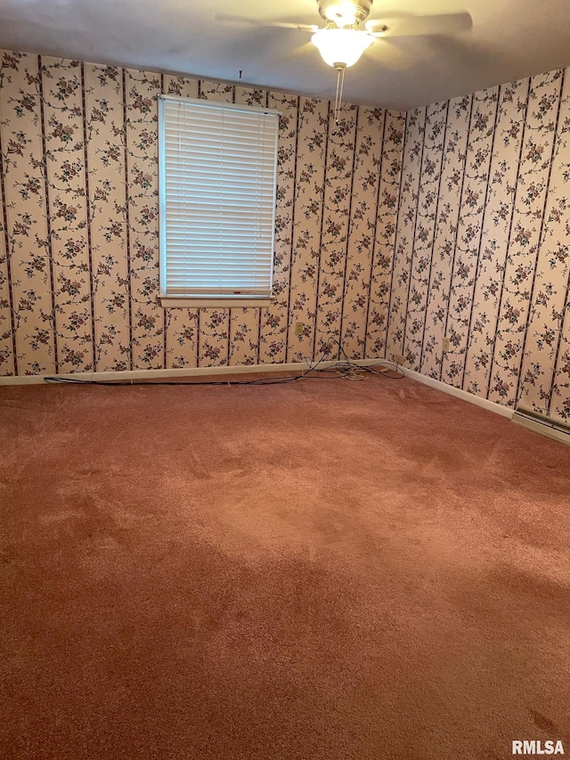 901 W Elm St, Carmi, IL 62821 - carpeted spare room with ceiling fan and baseboards