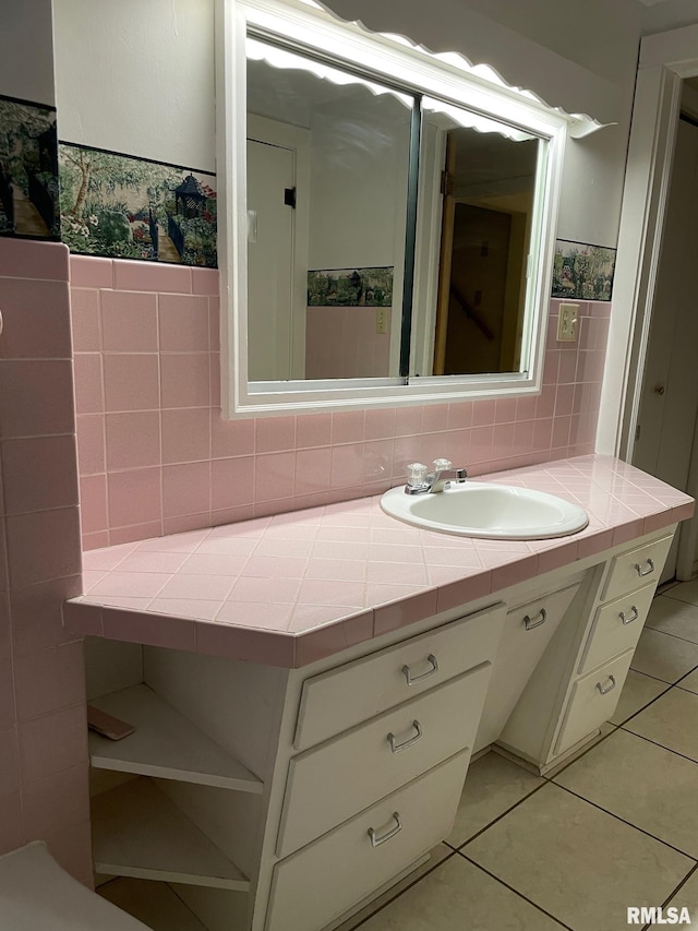 901 W Elm St, Carmi, IL 62821 - bathroom with vanity, tile patterned floors, and a wainscoted wall