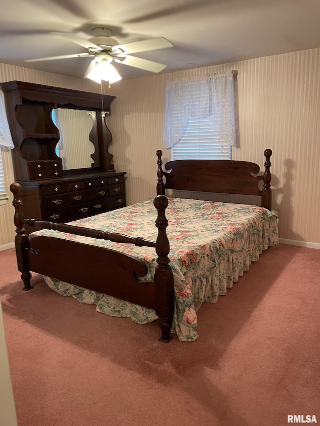 901 W Elm St, Carmi, IL 62821 - carpeted bedroom featuring ceiling fan and multiple windows