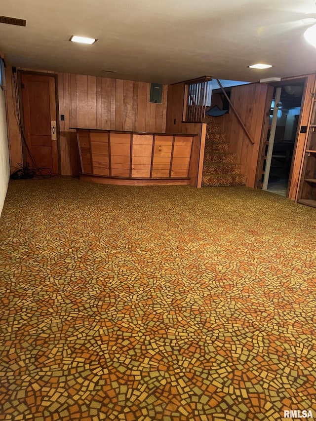 901 W Elm St, Carmi, IL 62821 - finished basement featuring wooden walls, stairway, and electric panel