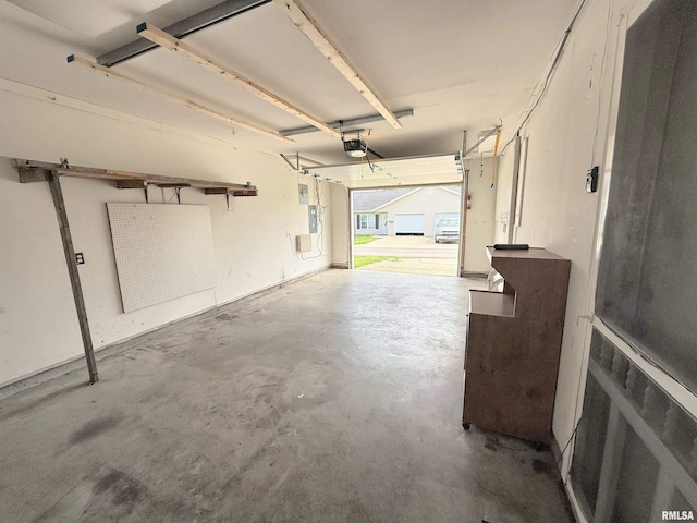1002 Elm St, Marion, IL 62959 - garage featuring a garage door opener