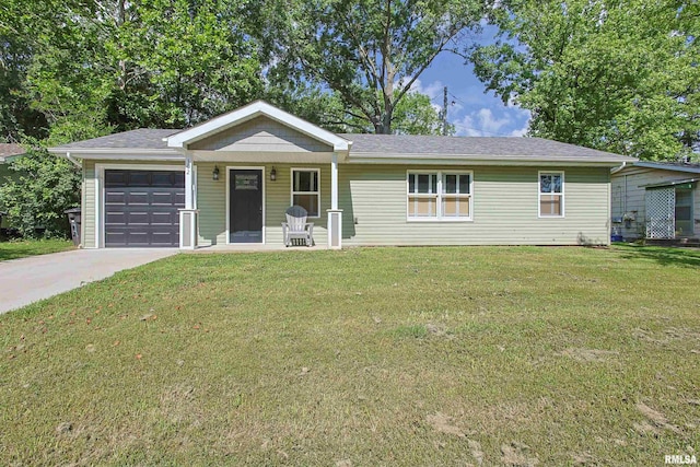 302 S Gray Dr, Carbondale, IL 62901 - single story home with an attached garage, covered porch, driveway, and a front yard