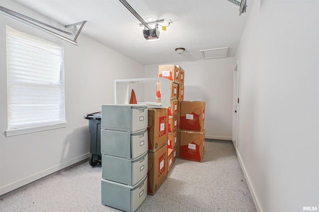 302 S Gray Dr, Carbondale, IL 62901 - bedroom featuring a garage and dark speckled floor