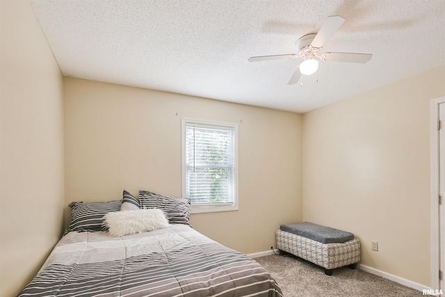 416 W Harrison St, Carrier Mills, IL 62917 - bedroom with carpet, a textured ceiling, and ceiling fan