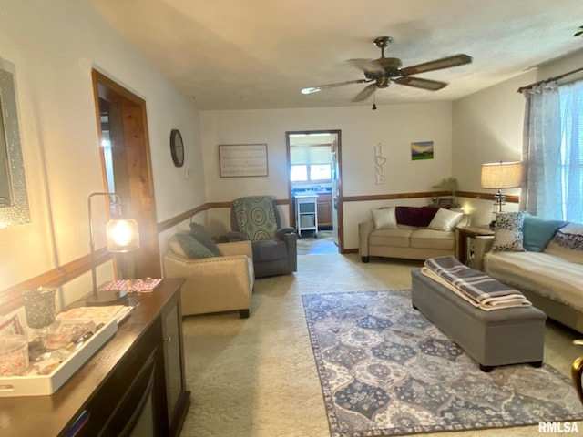 1915 E Oak St, West Frankfort, IL 62896 - living room with light colored carpet and ceiling fan
