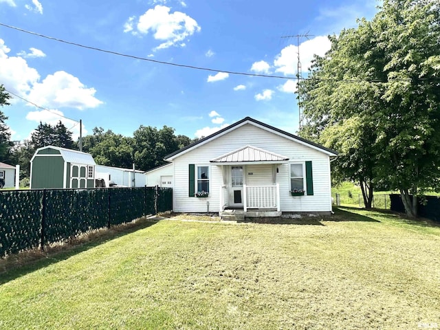 2448 E State Route 161st Rte, Centralia, IL 62801 - rear view of house with covered porch and a shed