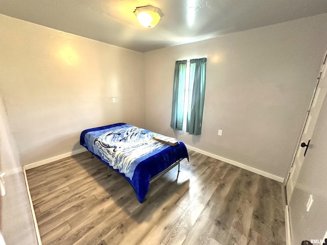 2448 E State Route 161st Rte, Centralia, IL 62801 - bedroom with baseboards and wood finished floors