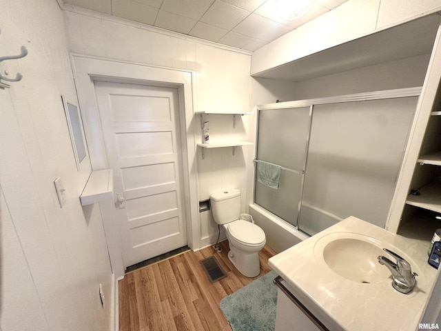 2448 E State Route 161st Rte, Centralia, IL 62801 - bathroom with enclosed tub / shower combo, wood finished floors, and vanity