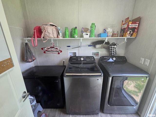 303 N Marion St, Centralia, IL 62801 - washroom with washer and dryer and wood finished floors