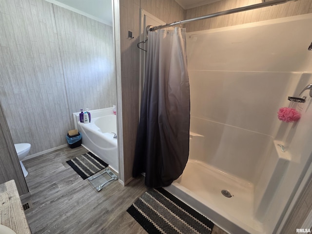 303 N Marion St, Centralia, IL 62801 - full bathroom featuring a shower stall, wood finished floors, wood walls, a garden tub, and ornamental molding