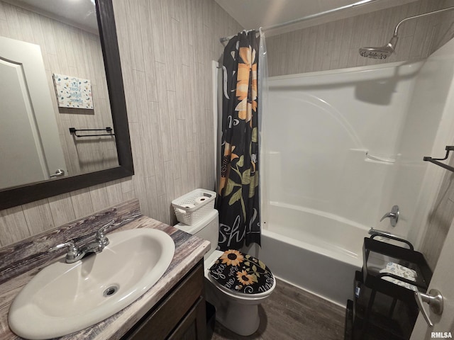 303 N Marion St, Centralia, IL 62801 - full bathroom featuring wood finished floors, shower / tub combo, vanity, and wood walls