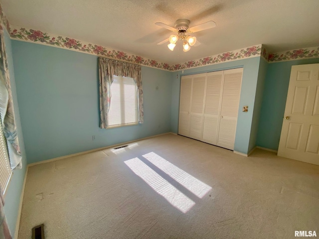 117 N Plains Ave, Marion, IL 62959 - unfurnished bedroom with carpet flooring, a closet, and ceiling fan