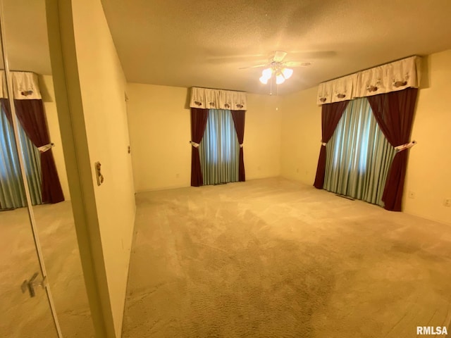 117 N Plains Ave, Marion, IL 62959 - carpeted empty room featuring a ceiling fan and a textured ceiling