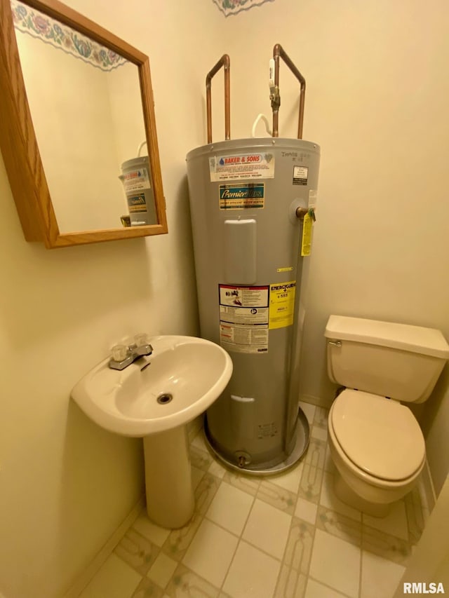 117 N Plains Ave, Marion, IL 62959 - half bathroom with electric water heater and toilet