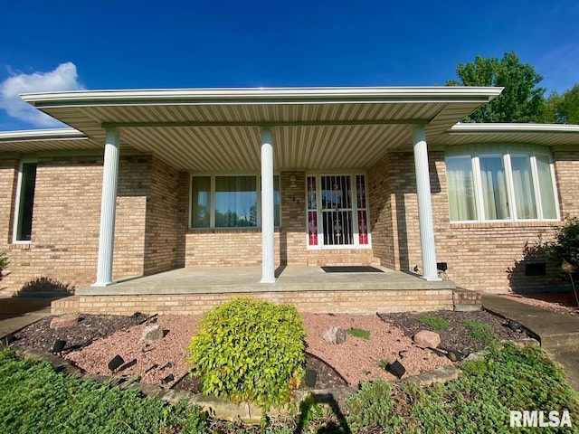 117 N Plains Ave, Marion, IL 62959 - entrance to property featuring a porch and brick siding