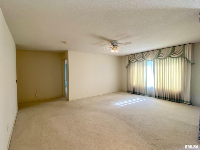 117 N Plains Ave, Marion, IL 62959 - empty room with ceiling fan, light colored carpet, a textured ceiling, and a smoke detector