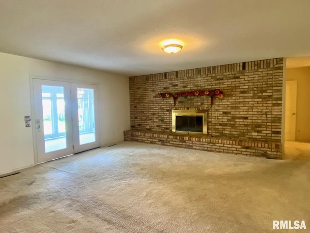 117 N Plains Ave, Marion, IL 62959 - unfurnished living room with carpet flooring and a fireplace