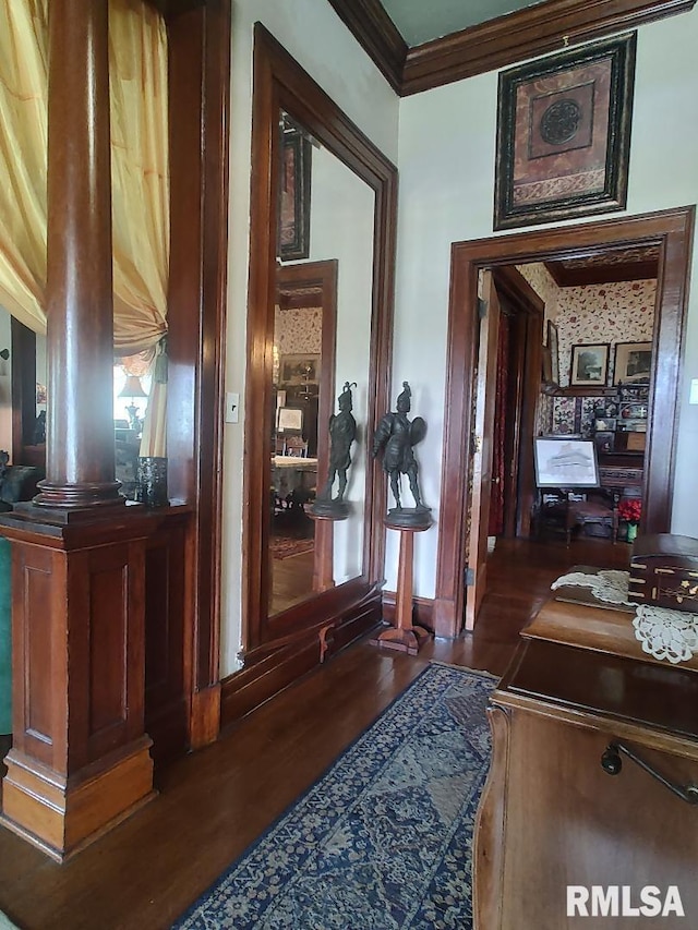 319 High St, Mound City, IL 62963 - corridor with decorative columns, ornamental molding, and dark wood-style flooring