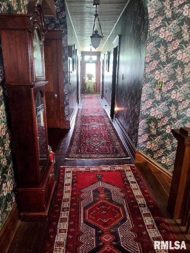 319 High St, Mound City, IL 62963 - hallway featuring wallpapered walls, wood-type flooring, and crown molding