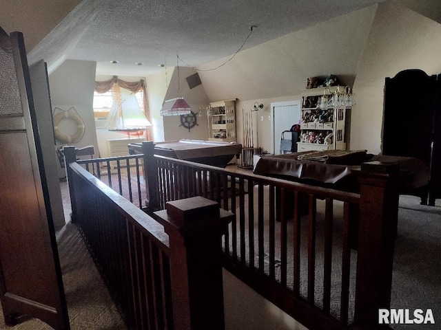319 High St, Mound City, IL 62963 - corridor with vaulted ceiling, carpet, a textured ceiling, and an upstairs landing