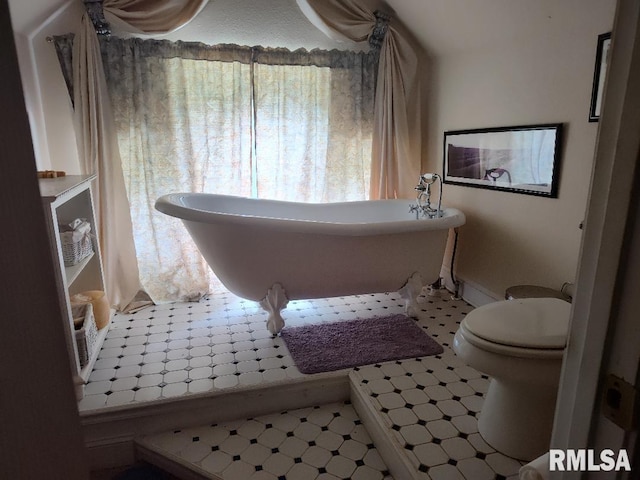 319 High St, Mound City, IL 62963 - full bathroom featuring tile patterned floors and a freestanding bath