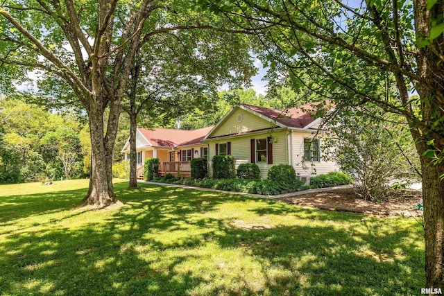 243 Pump Station Rd, Makanda, IL 62958 - ranch-style home with a front lawn and a deck
