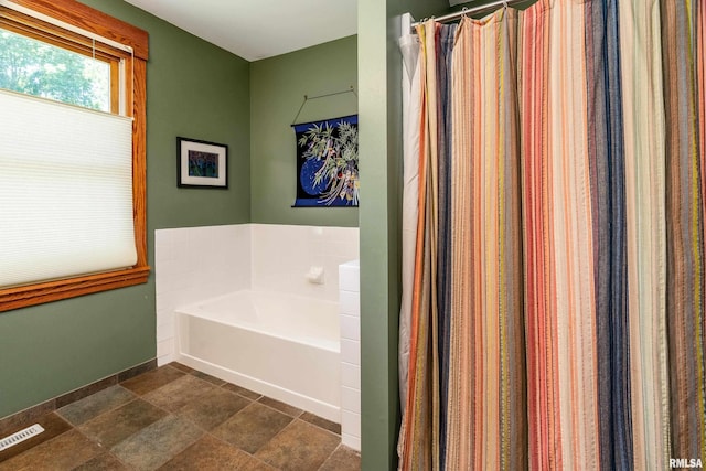 243 Pump Station Rd, Makanda, IL 62958 - full bath with a bath and stone finish flooring