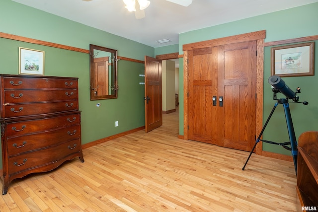 243 Pump Station Rd, Makanda, IL 62958 - bedroom with light wood finished floors and a ceiling fan