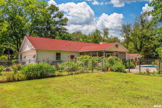 243 Pump Station Rd, Makanda, IL 62958 - back of house featuring a garage, a sunroom, and a community pool