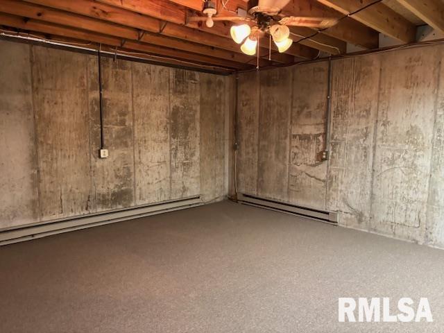 15944 Moellers Rd, Marion, IL 62959 - unfinished below grade area featuring a baseboard radiator and a ceiling fan