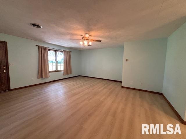 15944 Moellers Rd, Marion, IL 62959 - unfurnished room featuring baseboards and light wood-style flooring