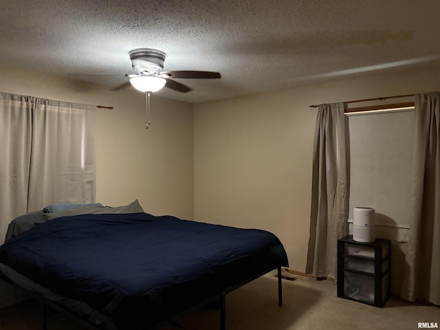 2119 Rains St, Murphysboro, IL 62966 - bedroom featuring carpet, a textured ceiling, and ceiling fan