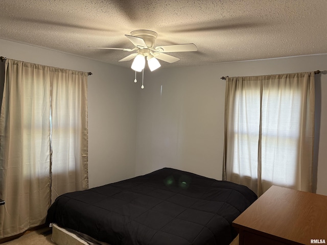 2119 Rains St, Murphysboro, IL 62966 - bedroom featuring a textured ceiling and a ceiling fan