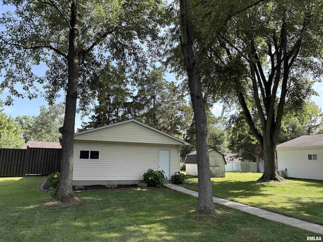 2119 Rains St, Murphysboro, IL 62966 - view of property exterior with a storage shed
