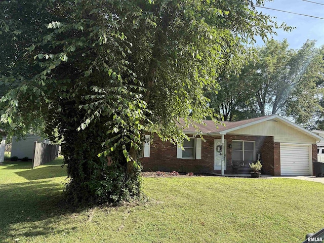 2119 Rains St, Murphysboro, IL 62966 - ranch-style home featuring a garage, brick siding, and a front yard