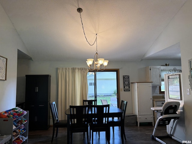 2119 Rains St, Murphysboro, IL 62966 - dining area with dark wood-style floors, vaulted ceiling, and a chandelier