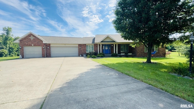 1016 Michael Ln, West Frankfort, IL 62812 - single story home featuring an attached garage, a front yard, brick siding, and driveway