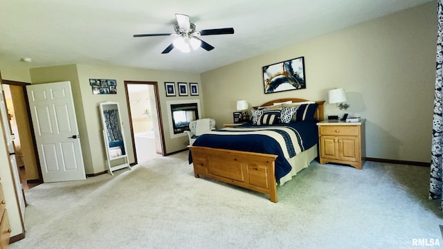 1016 Michael Ln, West Frankfort, IL 62812 - bedroom featuring light carpet, ceiling fan, and connected bathroom