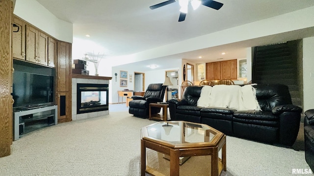 1016 Michael Ln, West Frankfort, IL 62812 - living room featuring light carpet, a tiled fireplace, ceiling fan, and recessed lighting